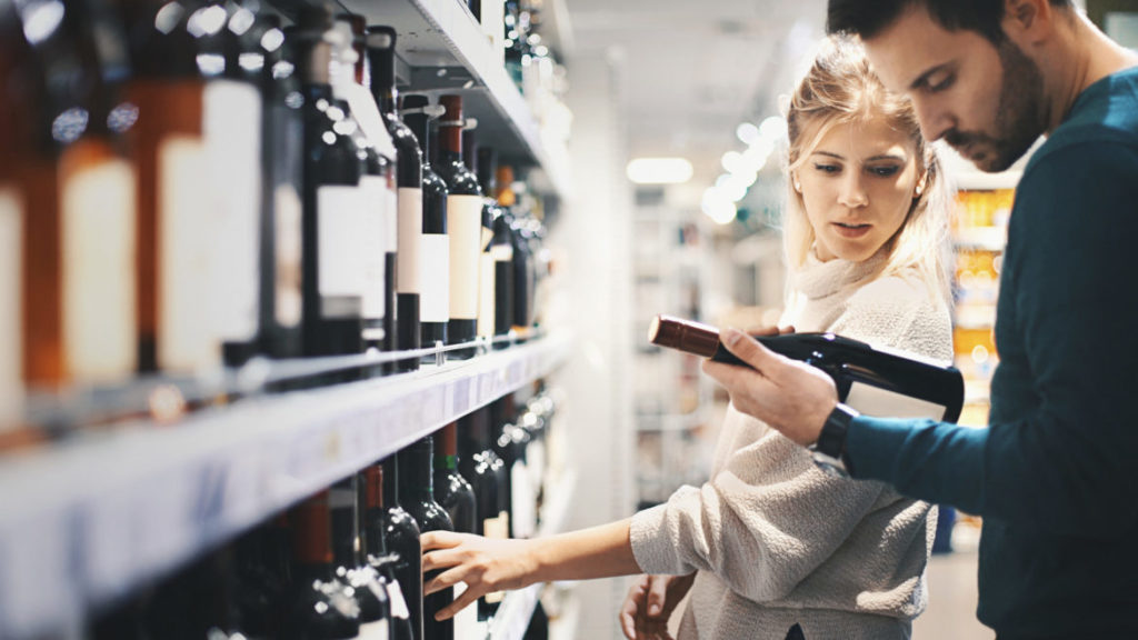 12.5.17 Blog Couple Picking Wine 1170x658